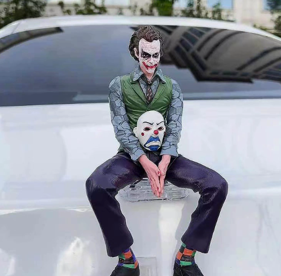 Dark Joker Style Sitting Figure – Villain Inspired Car Roof Ornament