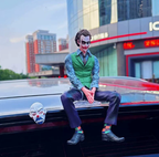 Dark Joker Style Sitting Figure – Villain Inspired Car Roof Ornament